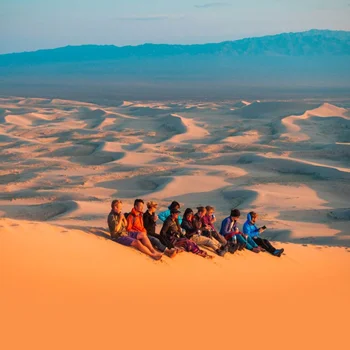 Image for Climb the “singing” dunes for panoramic desert views at sunset